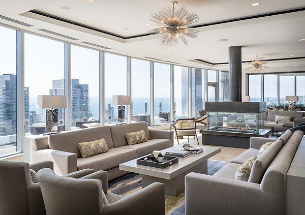 Spacious clubhouse with modern design at McKenzie Apartments, featuring luxurious seating and entertainment areas