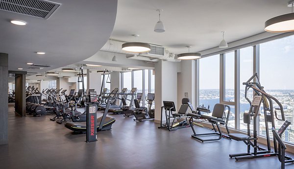 State-of-the-art fitness center with modern equipment at McKenzie Apartments luxury complex