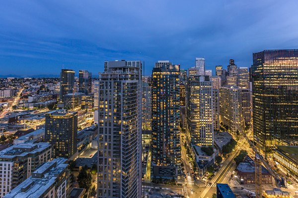 Skyline view at McKenzie Apartments: luxury city living with stunning architectural design in vibrant downtown neighborhood