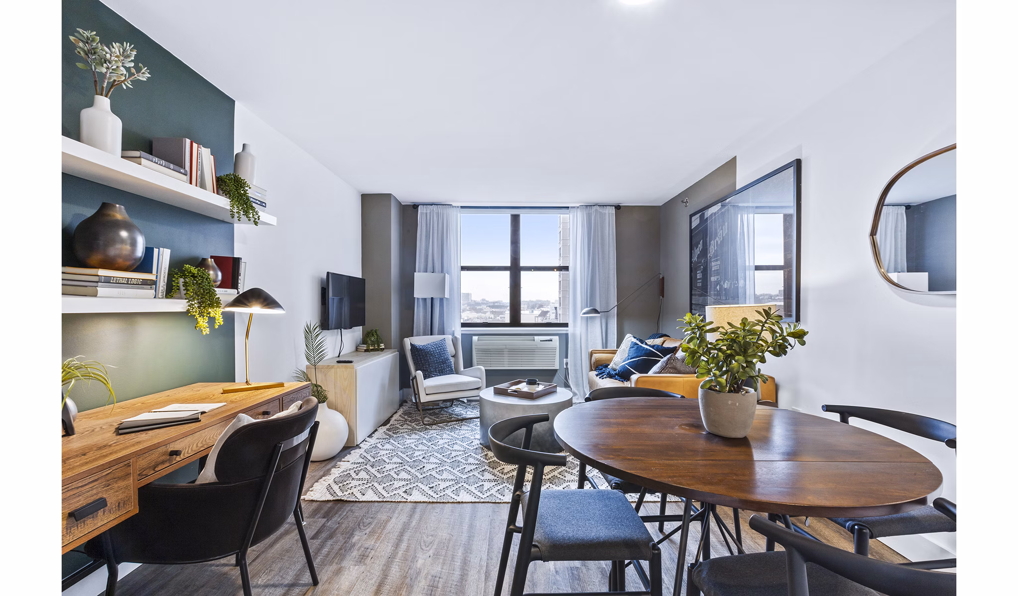 Bright living room with contemporary furnishings at Observer Park Apartments
