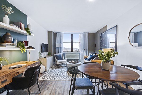 Bright living room with contemporary furnishings at Observer Park Apartments