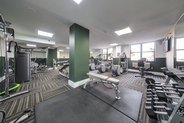 State-of-the-art fitness center at Observer Park Apartments with modern equipment for a comprehensive workout experience