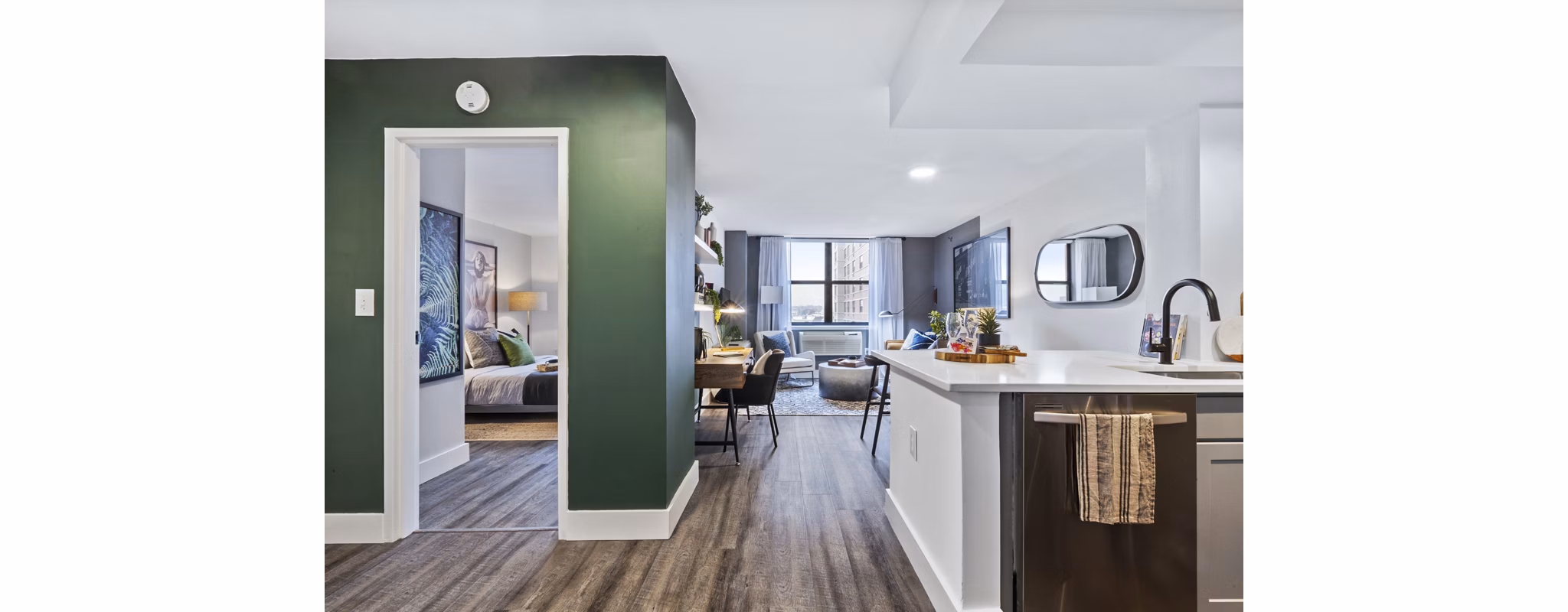 Modern kitchen with stainless steel appliances at Observer Park Apartments