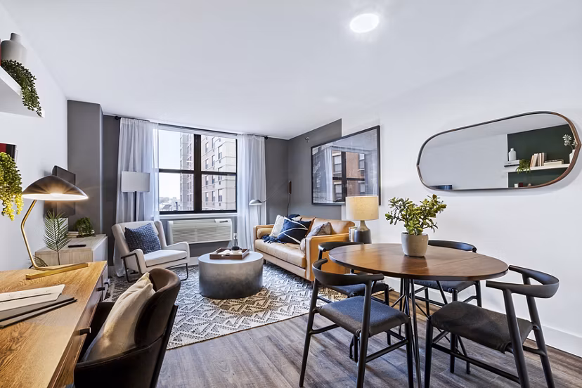 Dining room featuring sleek furnishings and modern lighting at Observer Park Apartments