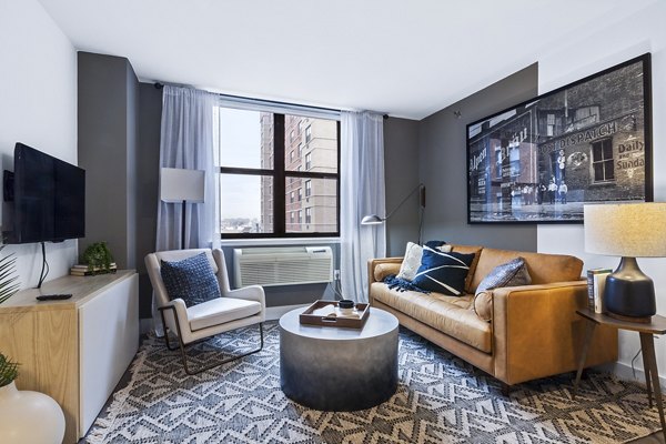 Living room with elegant furnishings at Observer Park Apartments