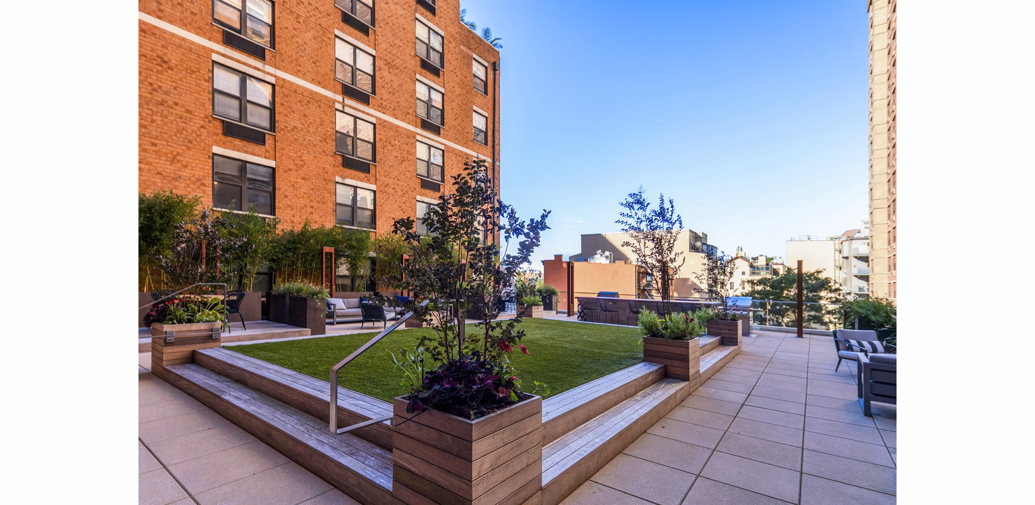 Private balcony with modern outdoor seating at Observer Park Apartments