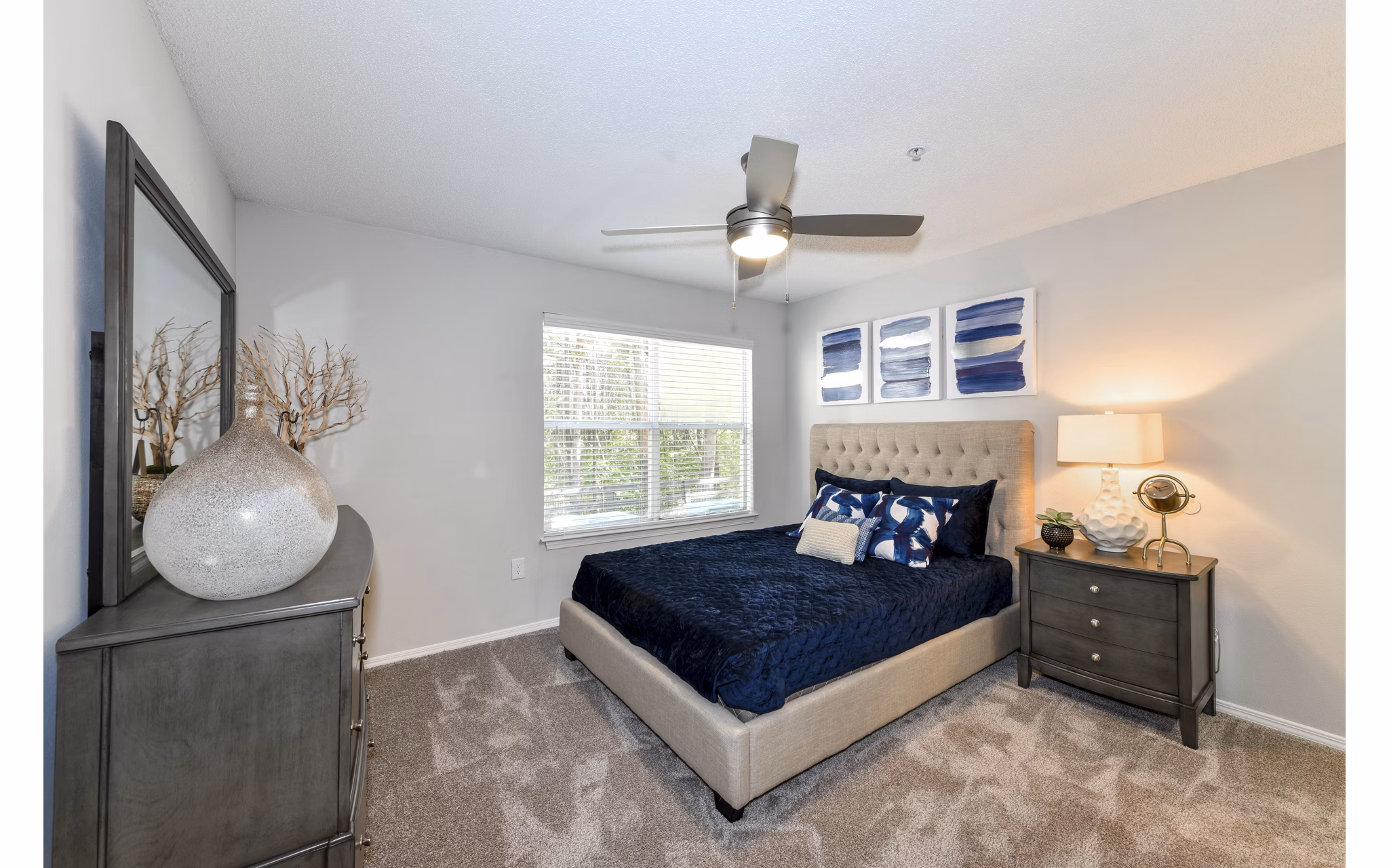 Cozy bedroom with stylish dÃ©cor at The Palmer Apartments, featuring a serene ambiance and modern furnishings