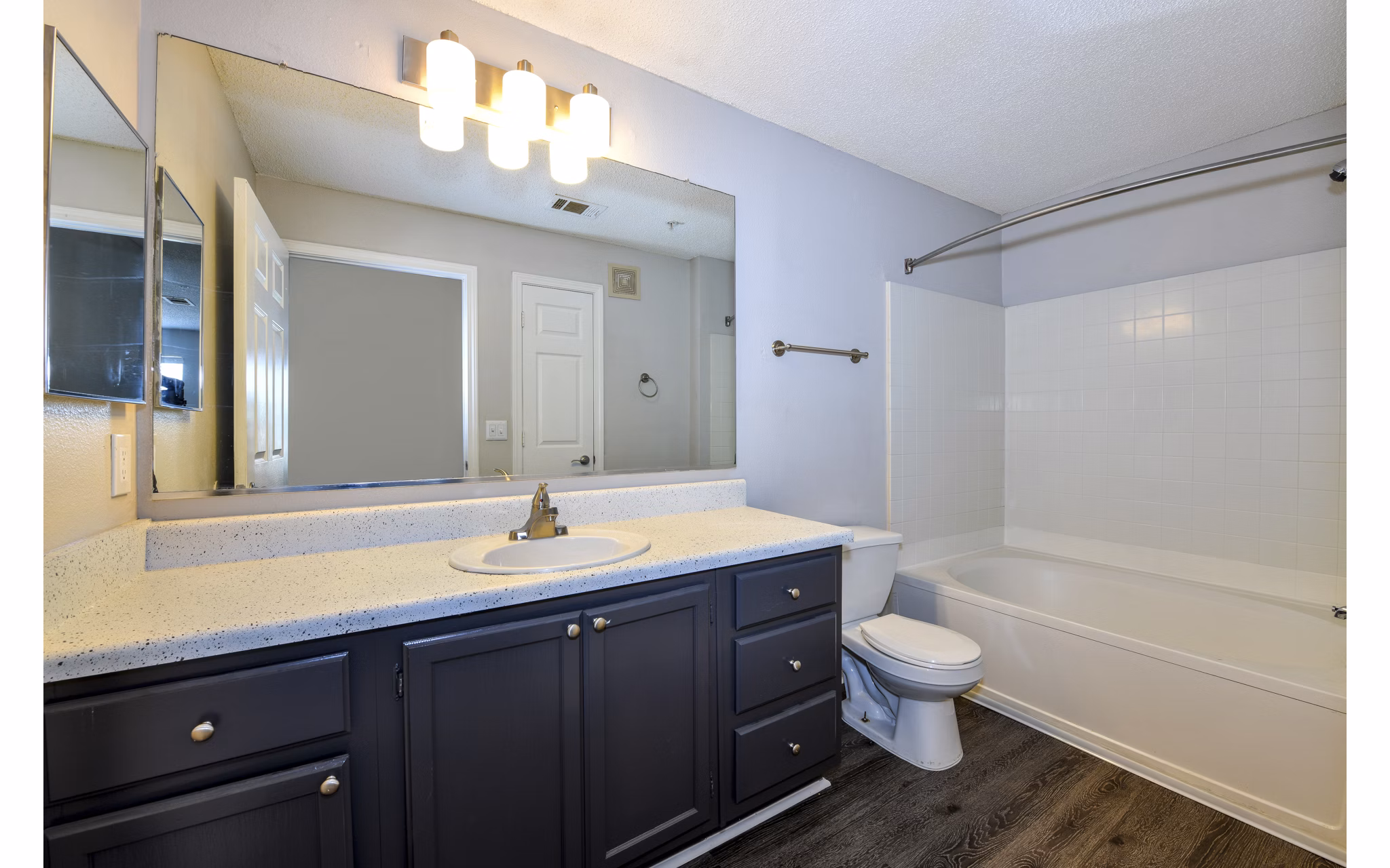 Modern bathroom with elegant fixtures at The Palmer Apartments