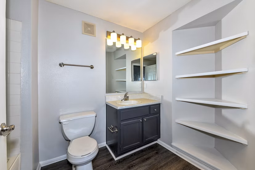 Spacious bathroom featuring modern fixtures at The Palmer Apartments