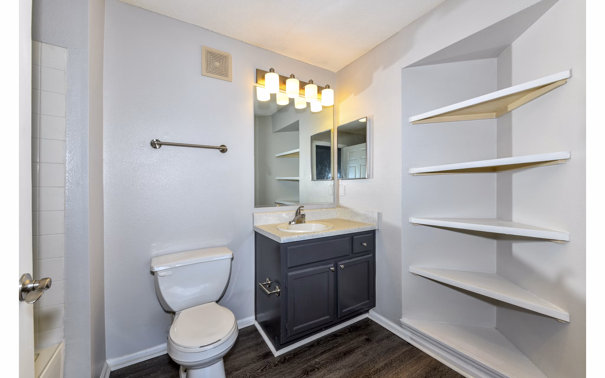 Spacious bathroom featuring modern fixtures at The Palmer Apartments