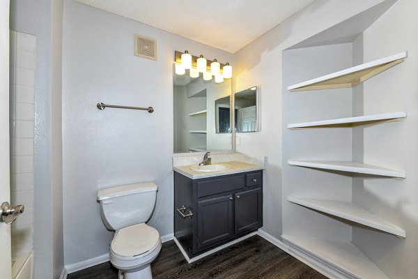 Spacious bathroom featuring modern fixtures at The Palmer Apartments