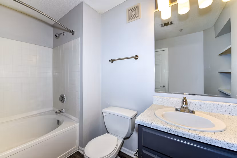 Modern bathroom with marble finishes in The Palmer Apartments