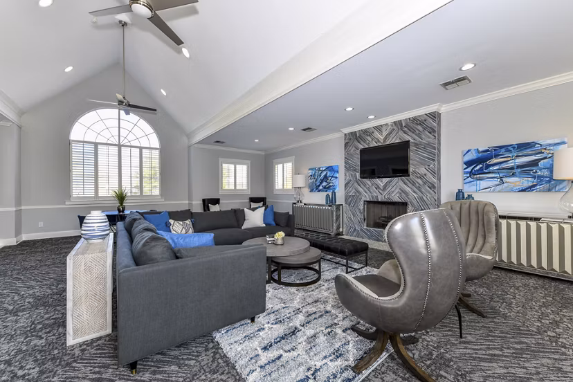 Clubhouse featuring stylish seating and modern decor at The Palmer Apartments