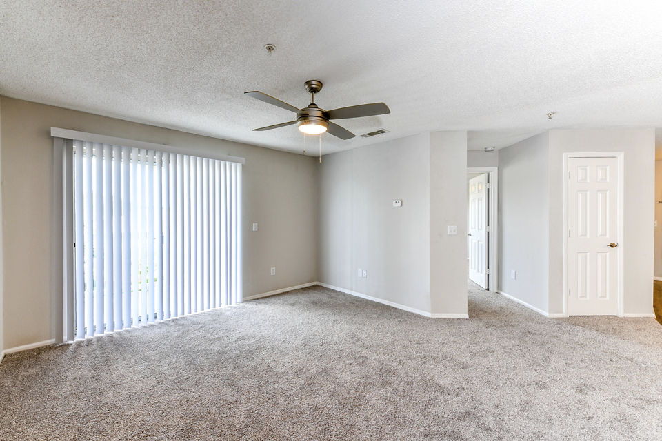 Spacious living room with modern decor at The Palmer Apartments in Greystar's luxury community