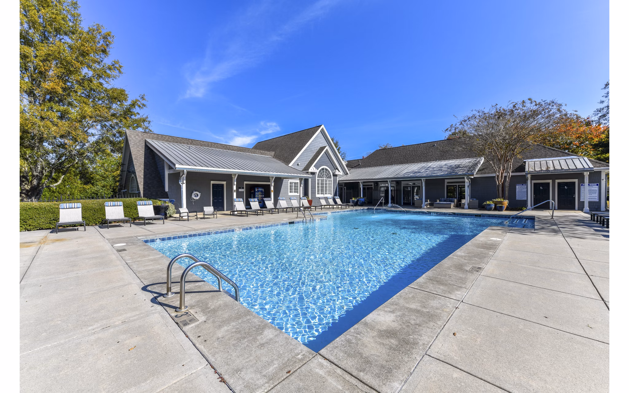 Luxury pool with cabanas at The Palmer Apartments offering upscale relaxation