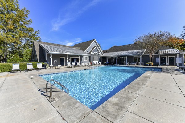 Luxury pool with cabanas at The Palmer Apartments offering upscale relaxation
