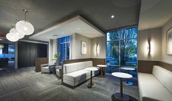 Clubhouse with modern design and stylish seating at Marq at the Pinehills Apartments