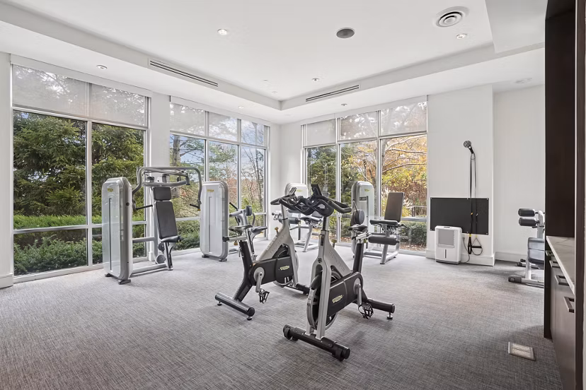 fitness center at Marq at the Pinehills Apartments 