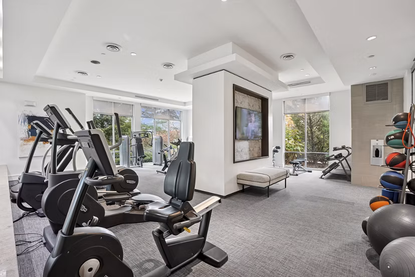 fitness center at Marq at the Pinehills Apartments 