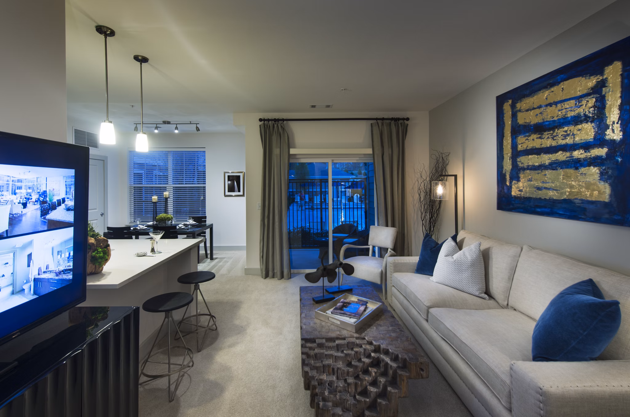 Cozy living room with elegant furnishings at Marq at the Pinehills Apartments