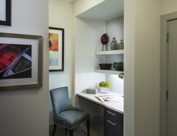 Cozy living room with modern furnishings at Marq at the Pinehills Apartments