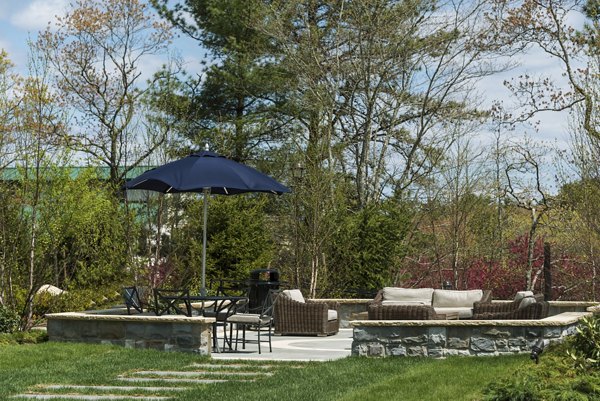 courtyard at Marq at the Pinehills Apartments
