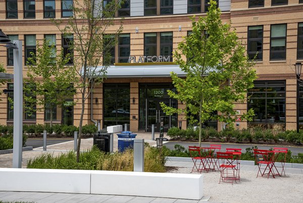 Platform: Stylish luxury apartment with outdoor seating and greenery