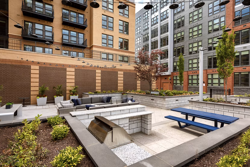 Community room with modern seating at GS Platform, featuring vibrant decor for socializing and relaxation