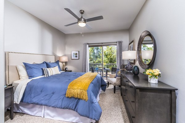 Modern bedroom with stylish decor at Overture Rancho Santa Margarita Active Adult Apartments