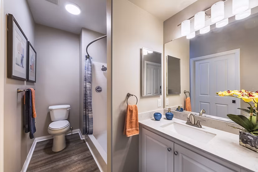 Bedroom with elegant design and natural light at Overture Rancho Santa Margarita Active Adult Apartments