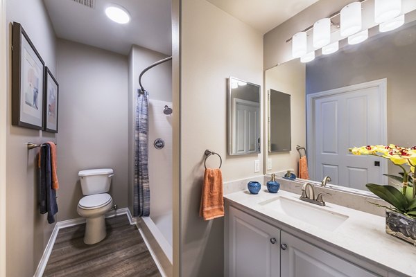 Bedroom with elegant design and natural light at Overture Rancho Santa Margarita Active Adult Apartments