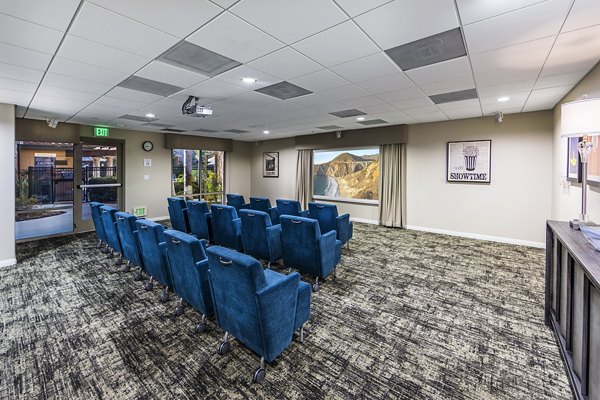 Clubhouse theater with plush seating at Overture Rancho Santa Margarita Active Adult Apartments