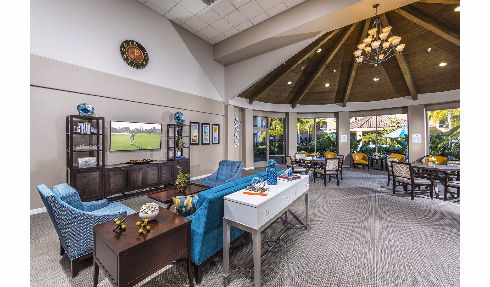 Stylish clubhouse at Overture Rancho Santa Margarita Active Adult Apartments with modern decor and seating areas