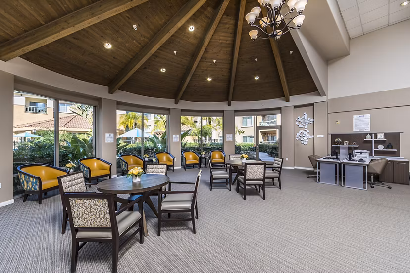 Clubhouse and leasing office at Overture Rancho Santa Margarita featuring vibrant interiors for active adults