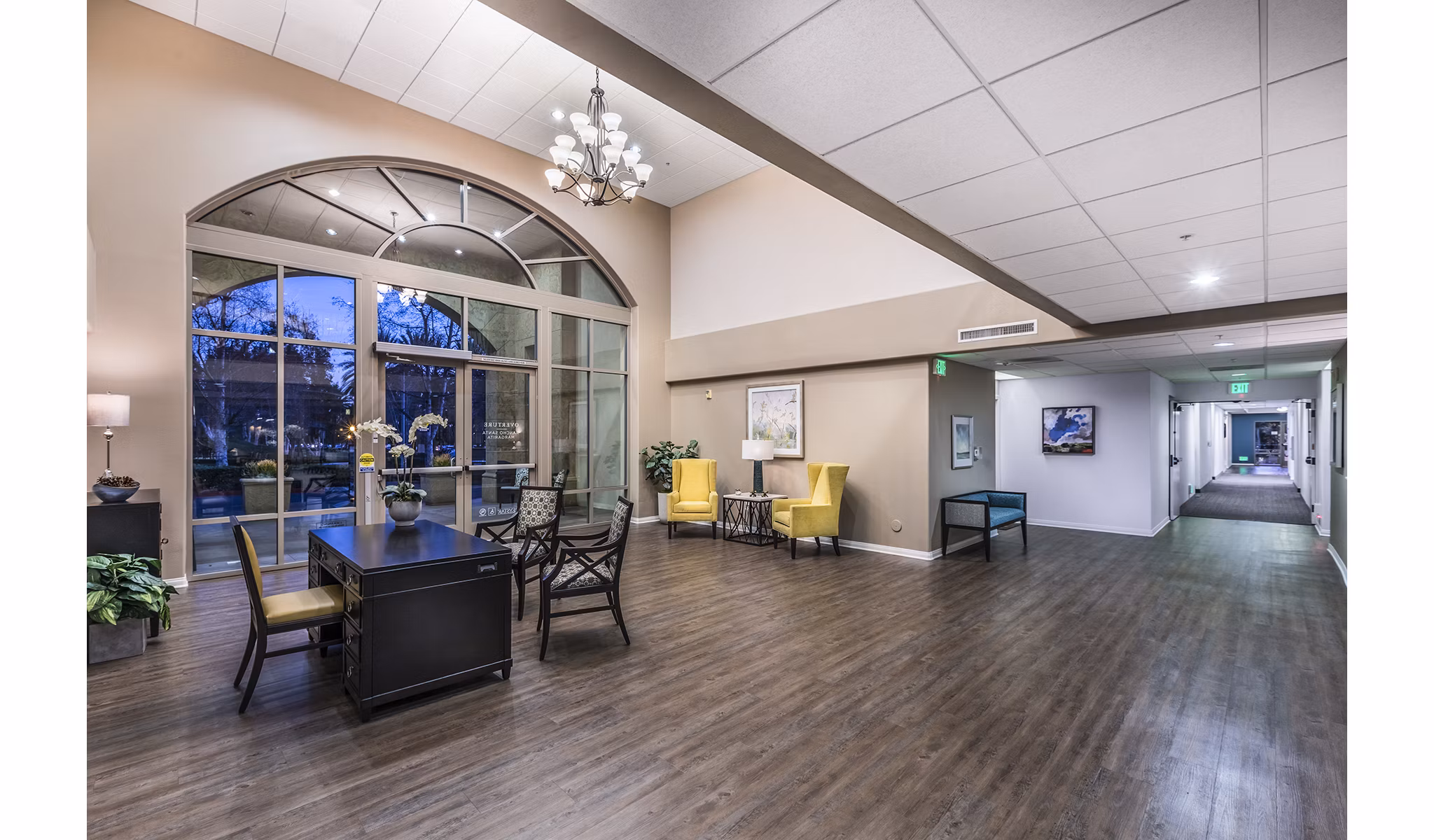 Clubhouse featuring modern lounge and dining areas at Overture Rancho Santa Margarita Active Adult Apartments