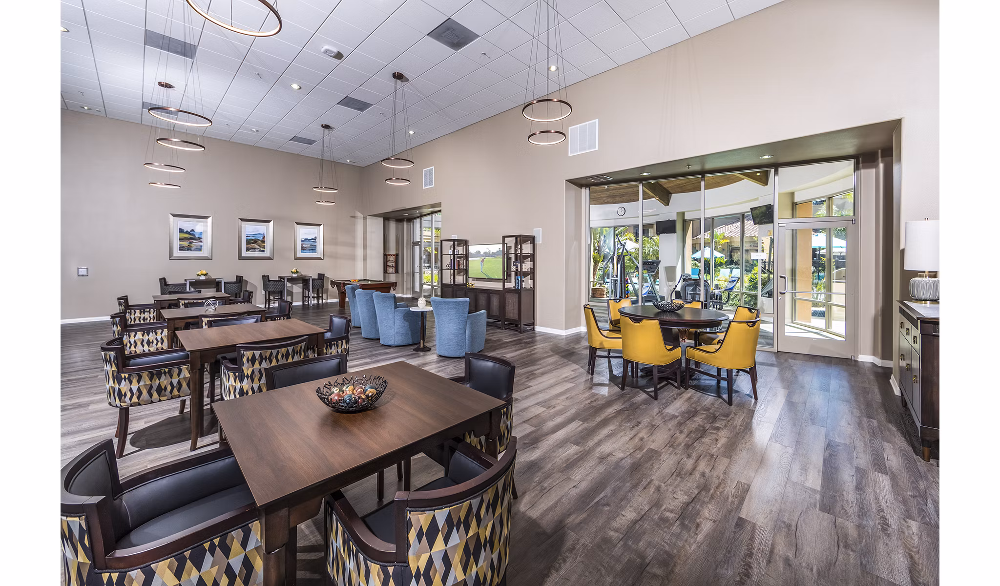 Clubhouse featuring modern design and seating at Overture Rancho Santa Margarita Active Adult Apartments
