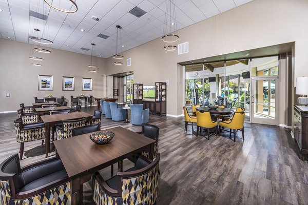 Clubhouse featuring modern design and seating at Overture Rancho Santa Margarita Active Adult Apartments