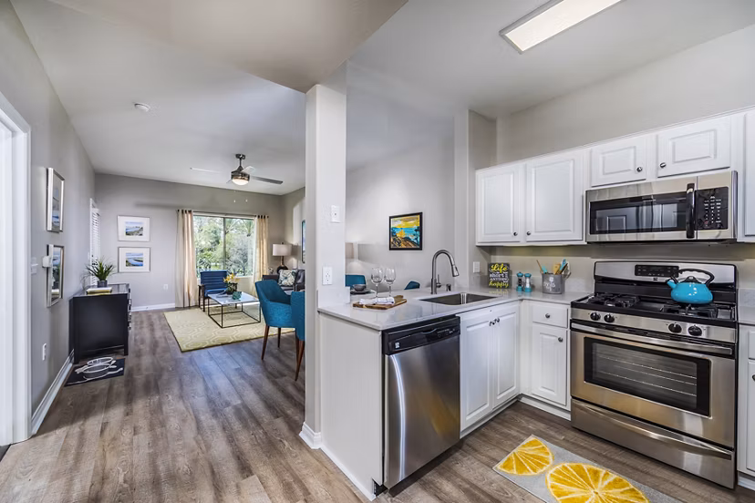 Modern kitchen with stainless steel appliances at Overture Rancho Santa Margarita Active Adult Apartments