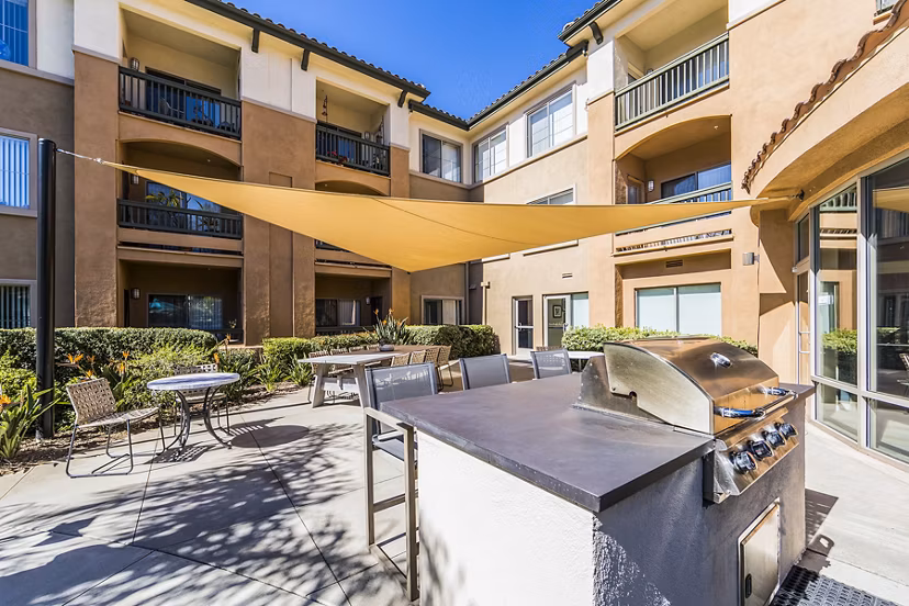 Grill area with modern amenities at Overture Rancho Santa Margarita Active Adult Apartments, perfect for outdoor gatherings and socializing