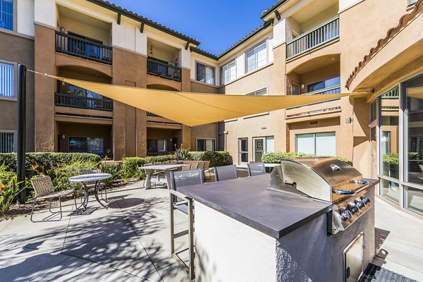 Grill area with modern amenities at Overture Rancho Santa Margarita Active Adult Apartments, perfect for outdoor gatherings and socializing