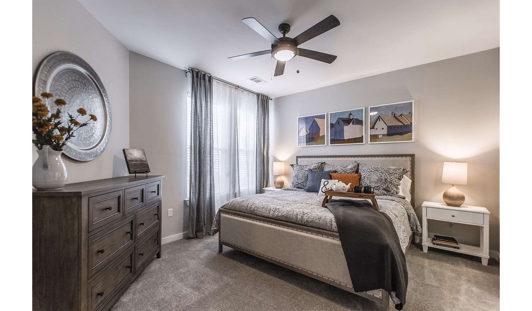 Cozy bedroom with modern furnishings at Novel Lockwood Glen Apartments