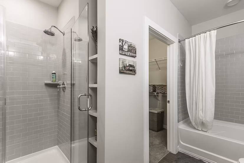 Modern bathroom with sleek fixtures and ample storage at Novel Lockwood Glen Apartments