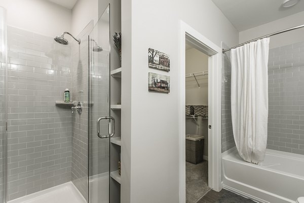 Modern bathroom with sleek fixtures and ample storage at Novel Lockwood Glen Apartments