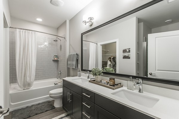 Modern bathroom with sleek fixtures at Novel Lockwood Glen Apartments