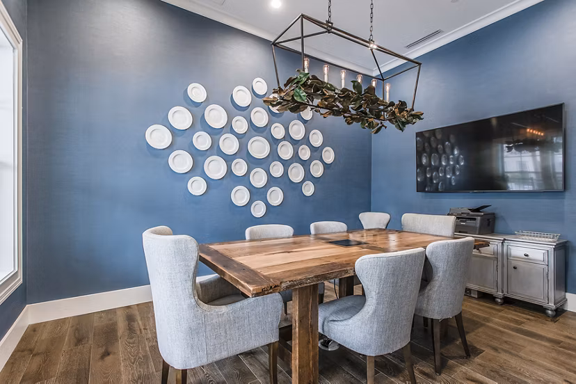 Clubhouse with modern furnishings and social spaces at Novel Lockwood Glen Apartments