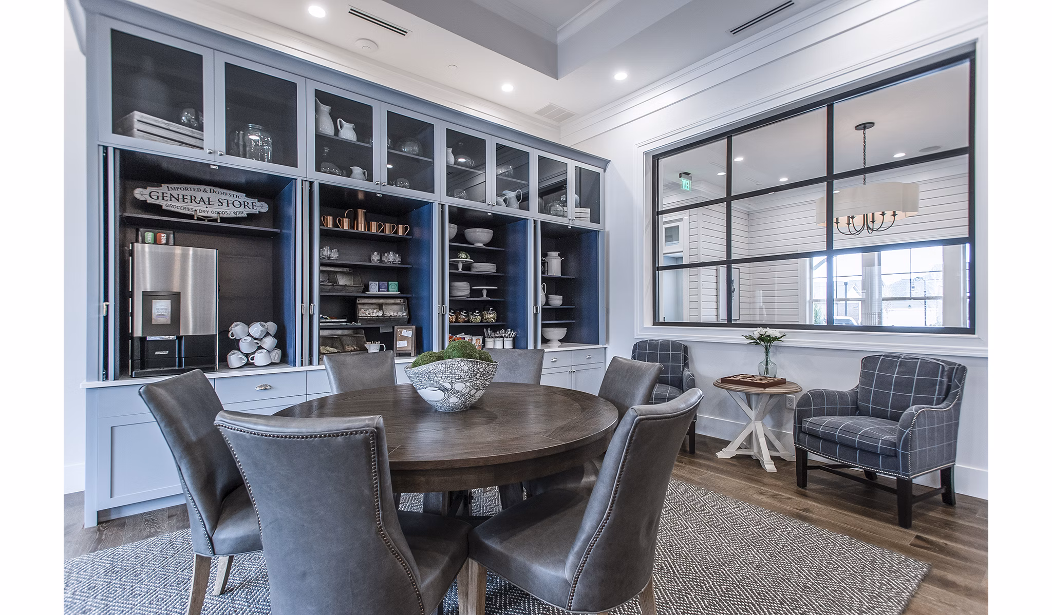 Clubhouse featuring modern design and cozy seating areas at Novel Lockwood Glen Apartments