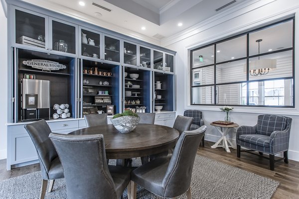 Clubhouse featuring modern design and cozy seating areas at Novel Lockwood Glen Apartments