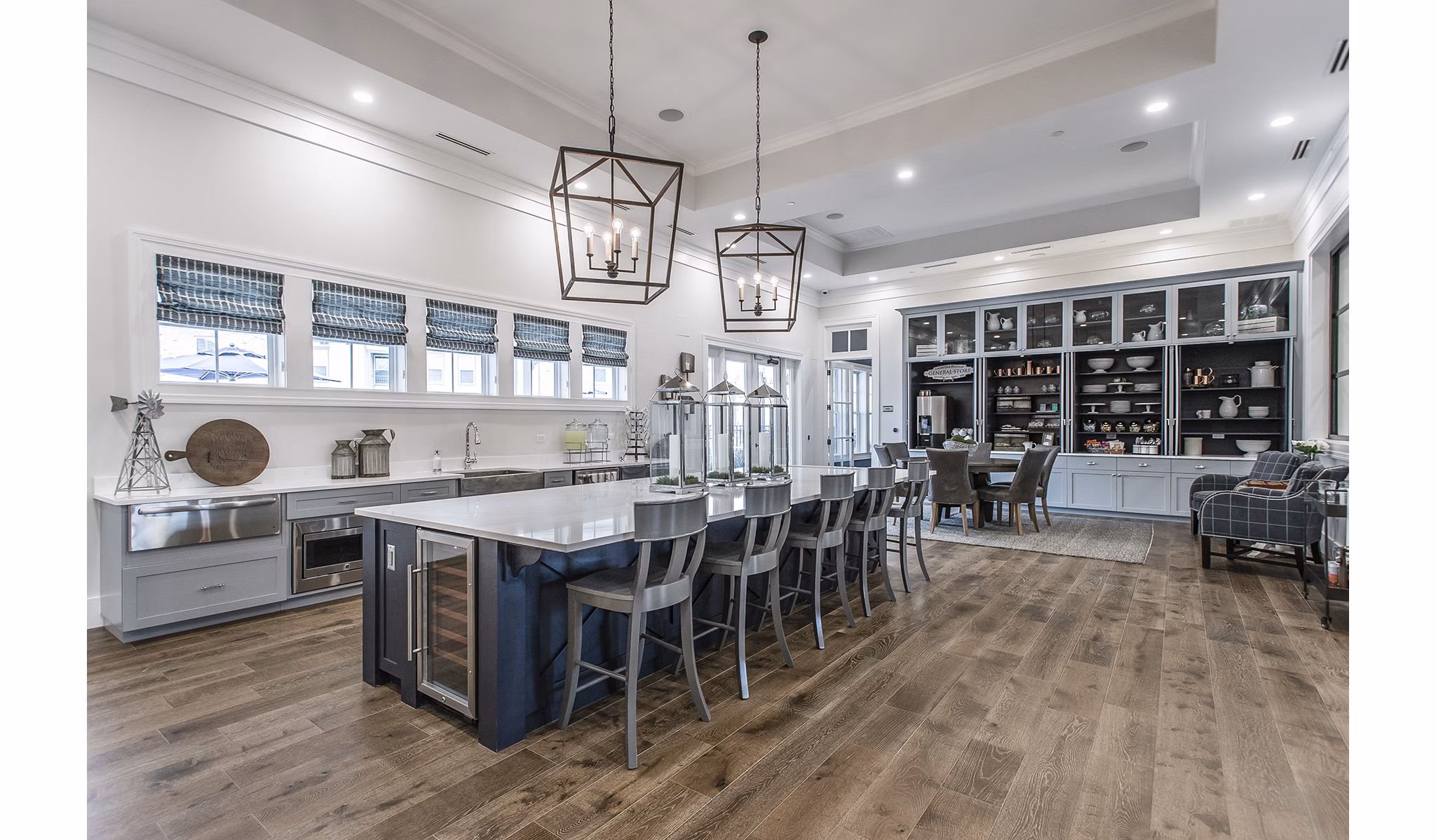 Modern clubhouse with lounge seating and games at Novel Lockwood Glen Apartments, a Greystar luxury apartment community