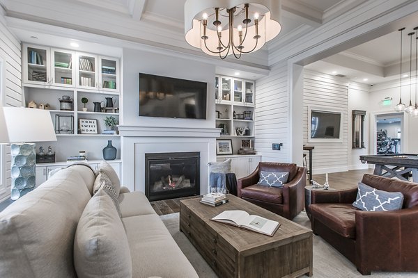 Clubhouse at Novel Lockwood Glen: Modern design with spacious seating and gaming areas for social gatherings in luxury apartments community