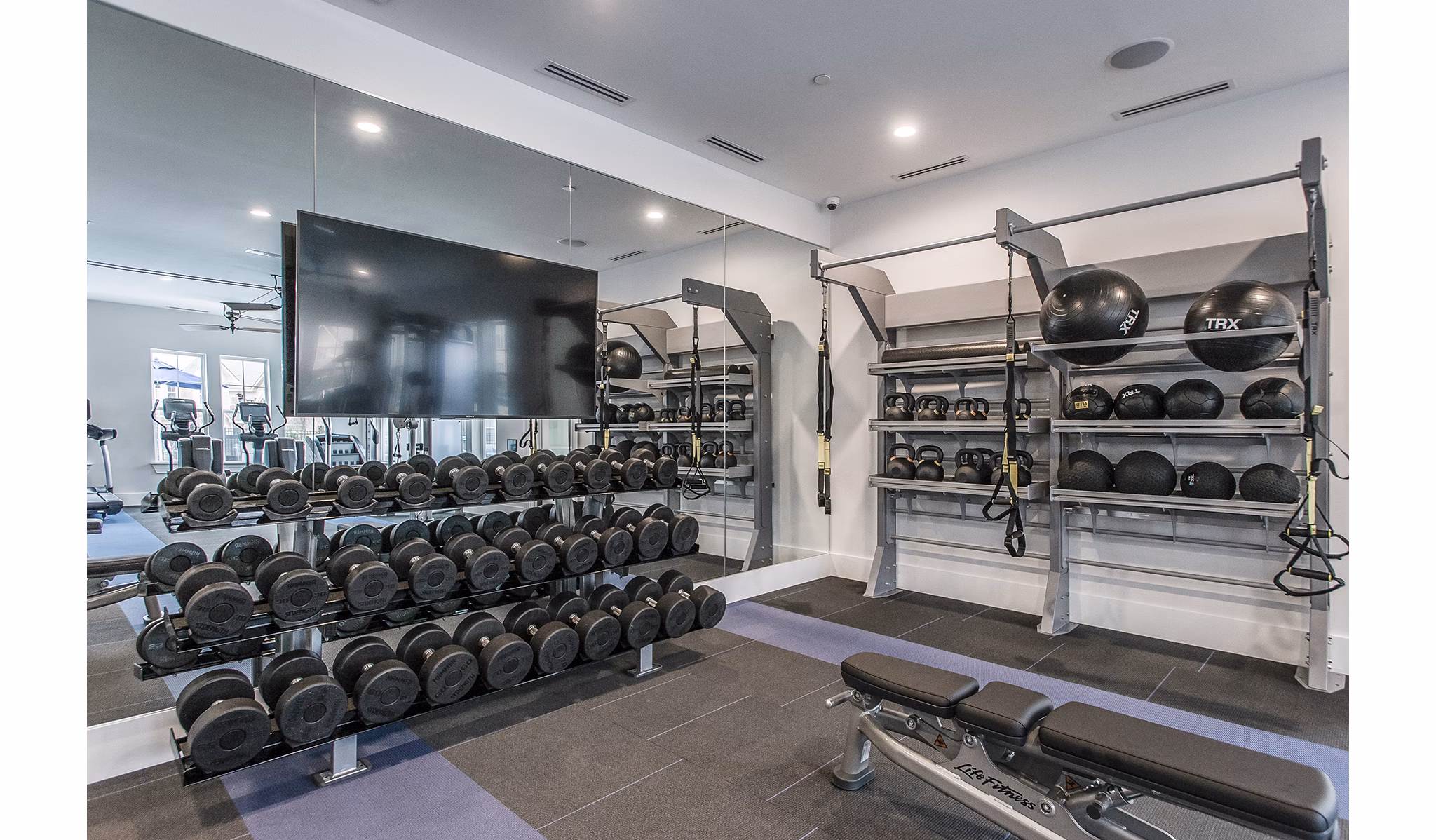 State-of-the-art fitness center with modern equipment in Novel Lockwood Glen Apartments Perfect for active lifestyles seeking luxury amenities